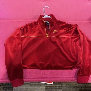 Red velvet jacket with yellow trim